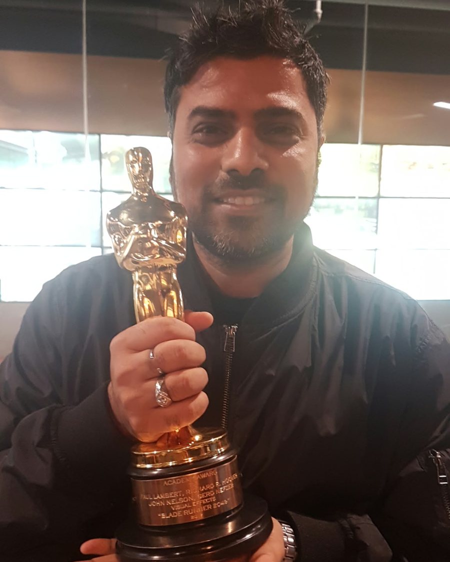Virender holding the Academy Award for Best Visual Effects for Blade Runner 2049
