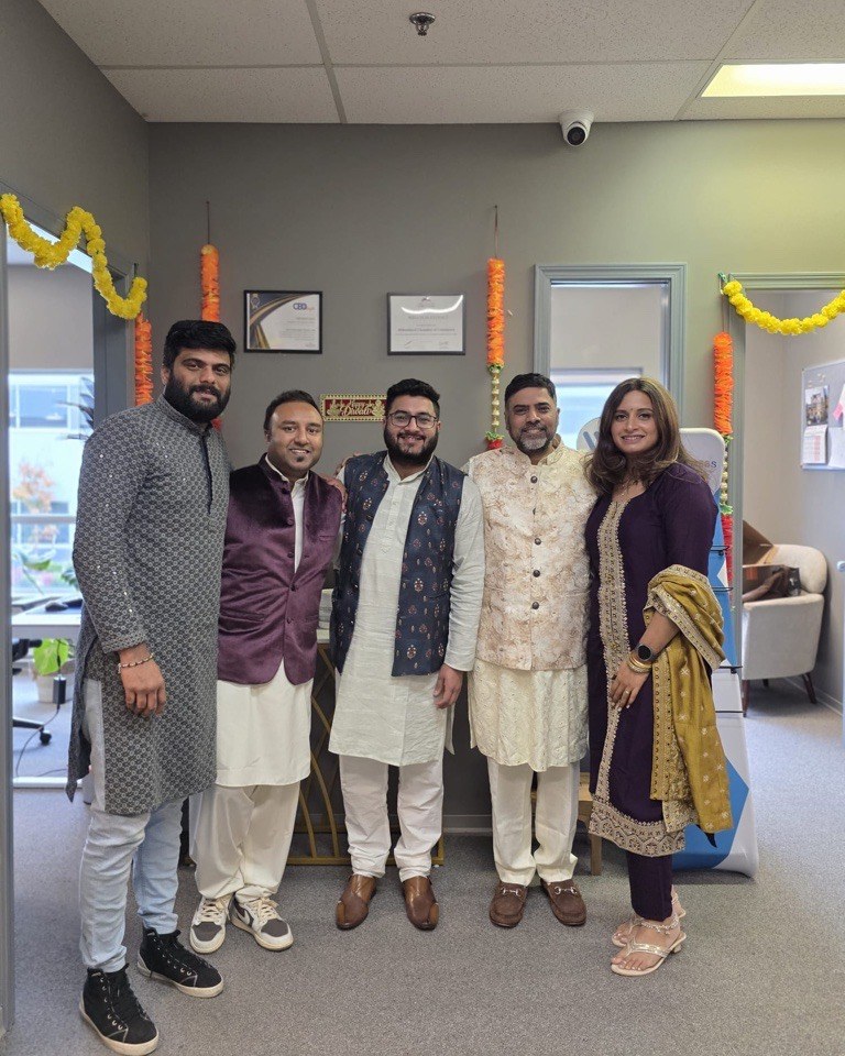 Virender with four colleagues celebrating Diwali at the office
